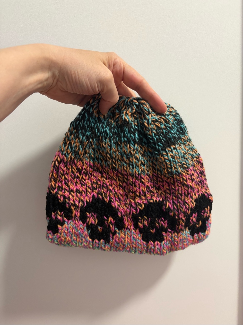 Women’s Multicolor Knit Beanie with Black Skull Pattern